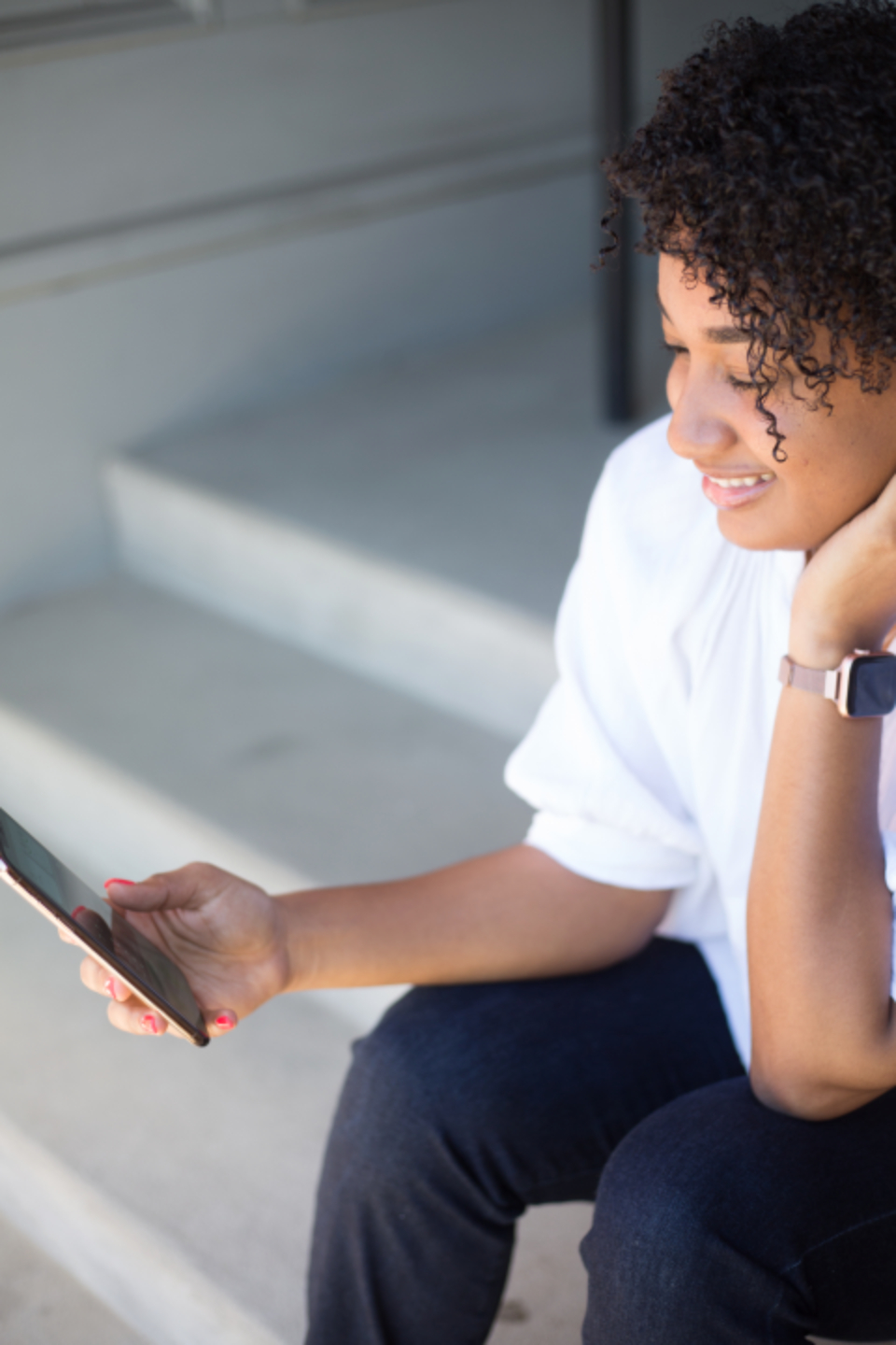 Woman using her phone while working